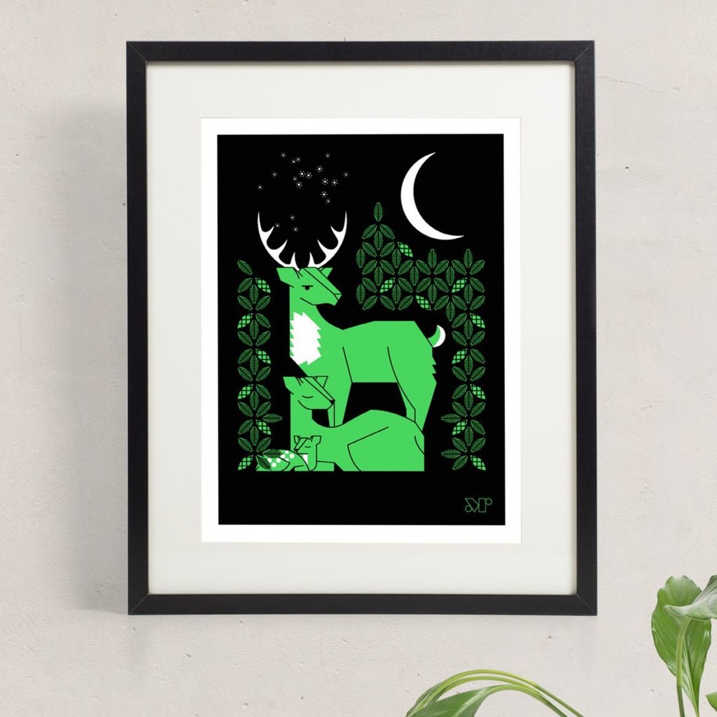 Near & Deer screen print in green and black. Shows a buck watching over a doe and fawn under stars and a crescent moon.