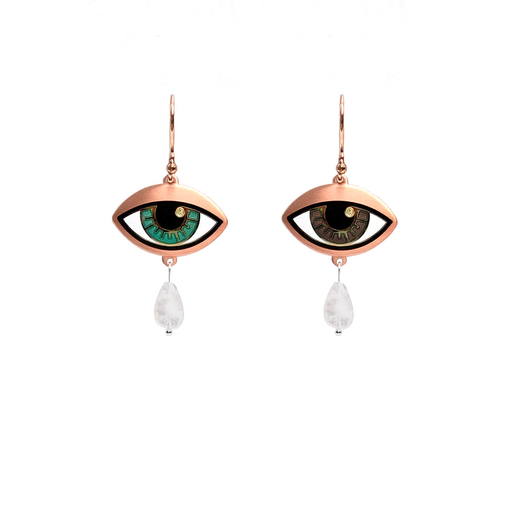 Ersa heterochromia eye earrings in gold and antique copper, with one each of jade and brown eyes. Rainbow moonstone drops.