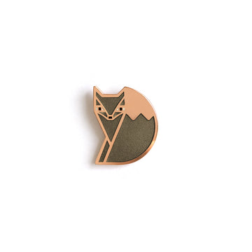 Foxsimile grey enamel fox pin in copper with sly eyes and a bushy tail.