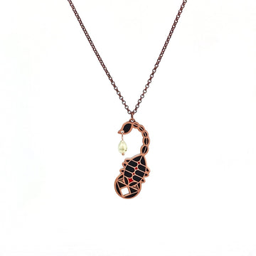 Ishara black enamel scorpion necklace in antique copper with prehnite poison teardrop dangle.