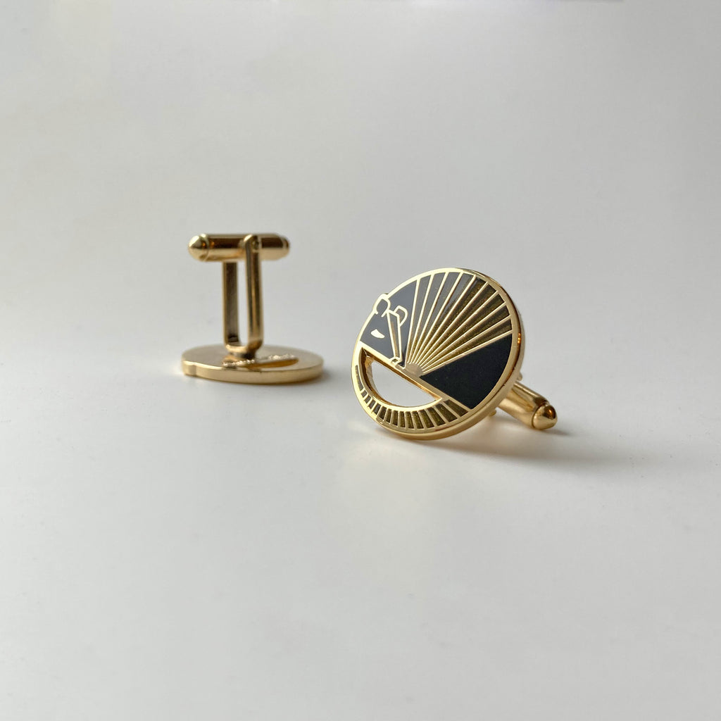 Reverse detail: Karmadillo black enamel armadillo cufflinks finished in 24k gold showing bullet toggle backs.