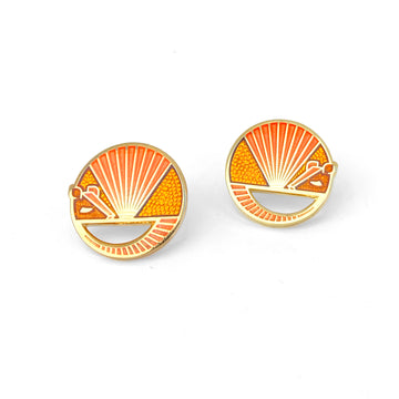 Karmadillo orange enamel armadillo earrings finished in 24k gold with nickel-free findings.