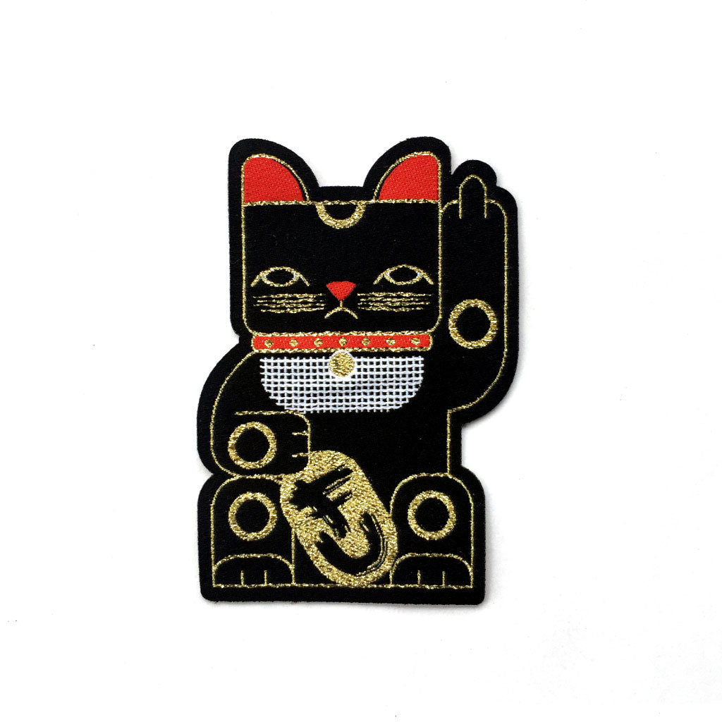 Goodbye Kitty black woven patch with red, gold and white. Shows a grumpy maneki neko rudely gesturing.