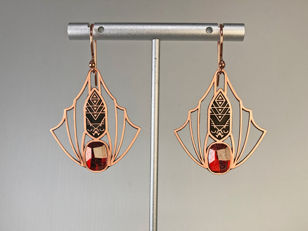 Minyades bat earrings in antique copper with wirework style wings, black enamel body and dark red siofourite crystals.