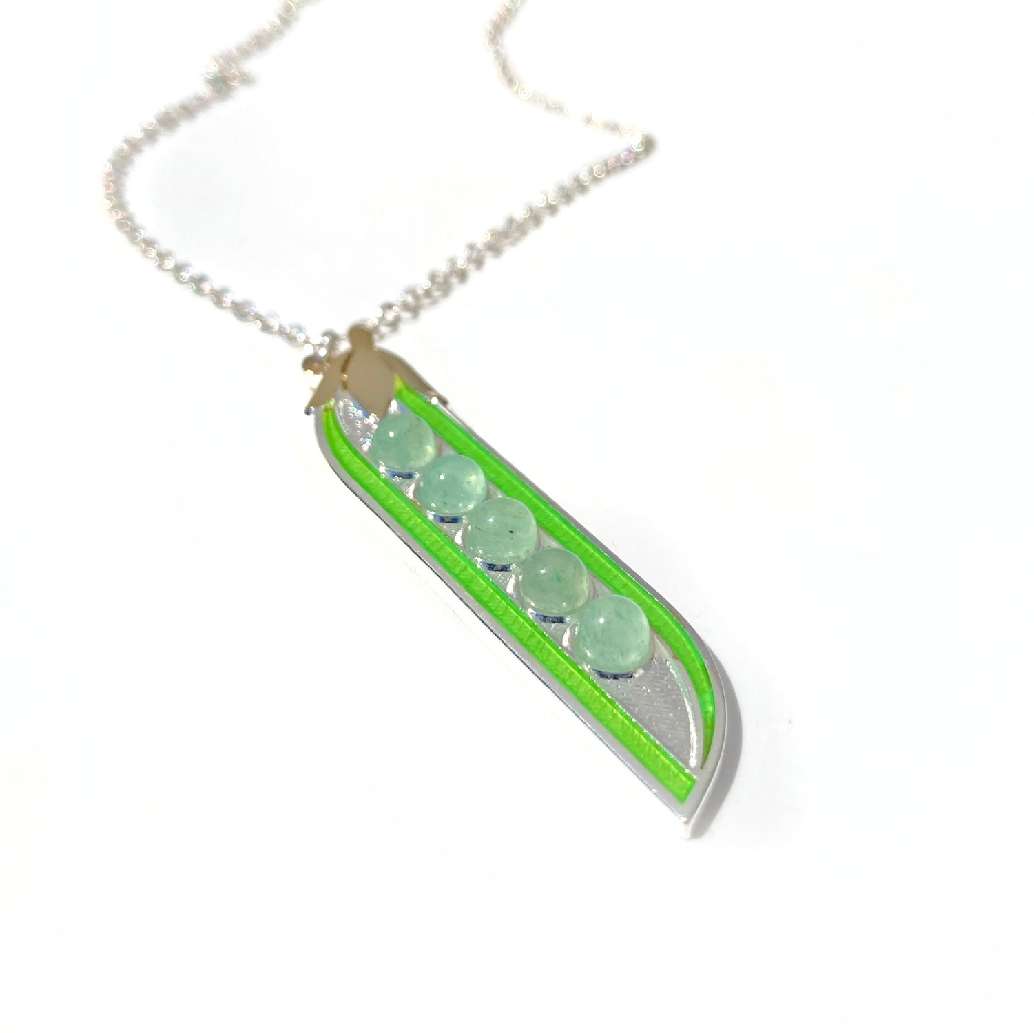 Pea pod necklace finished in 24k and sterling silver, with 5 green aventurine cabochon peas and silver chain.