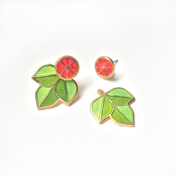 Ruby Red grapefruit earrings finished in 24k gold and sterling silver. Green enamel leaf ear jackets and sliced fruit studs.